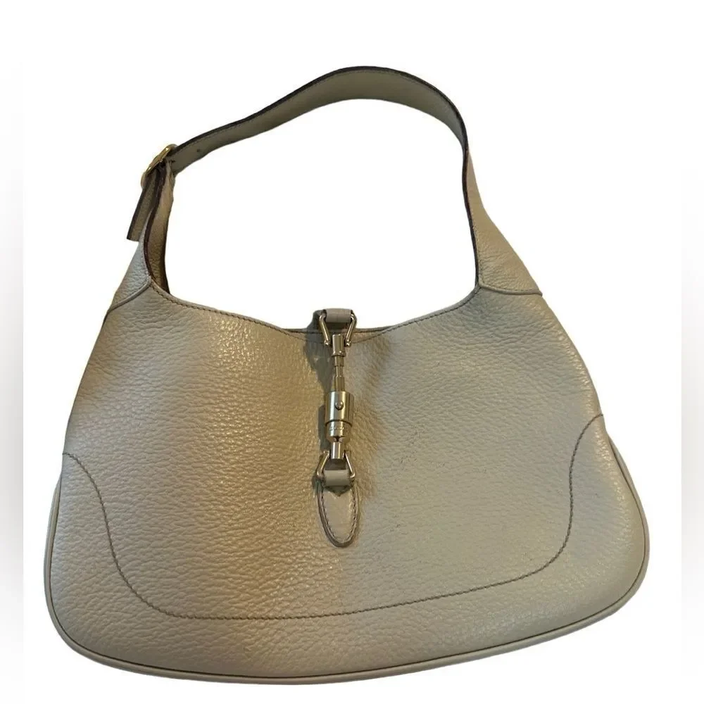 Gucci beiges leather Jackie bag with silver piston lock